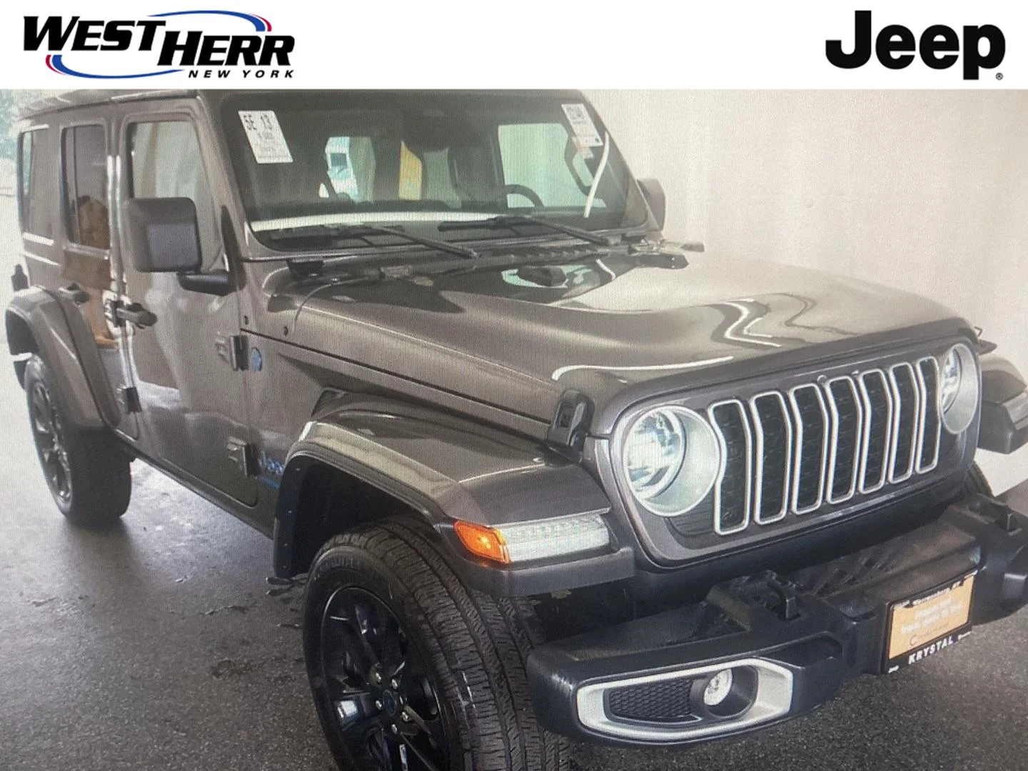 Used 2025 Granite Crystal Metallic Clearcoat Jeep Sahara image 1