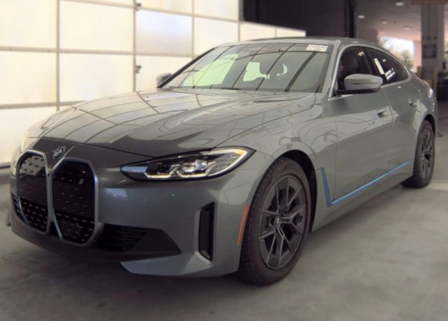 Used 2024 Gray Metallic BMW eDrive40 image 1