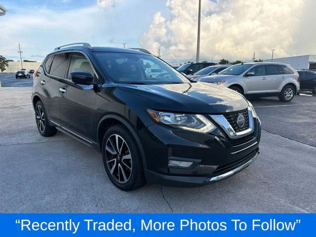 Used 2020 Black Nissan SL image 1