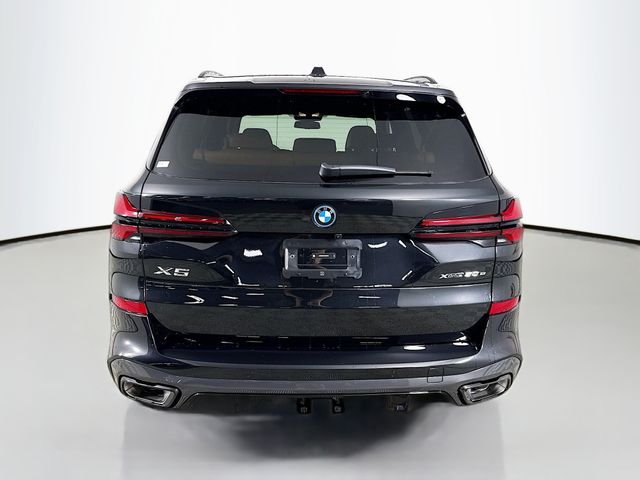 New 2026 Black Sapphire Metallic BMW xDrive50e image 6