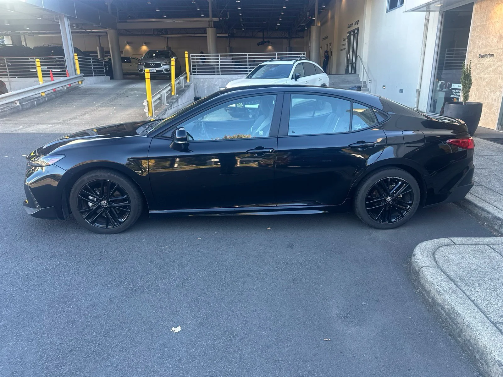 Used 2025 Black Toyota SE image 2
