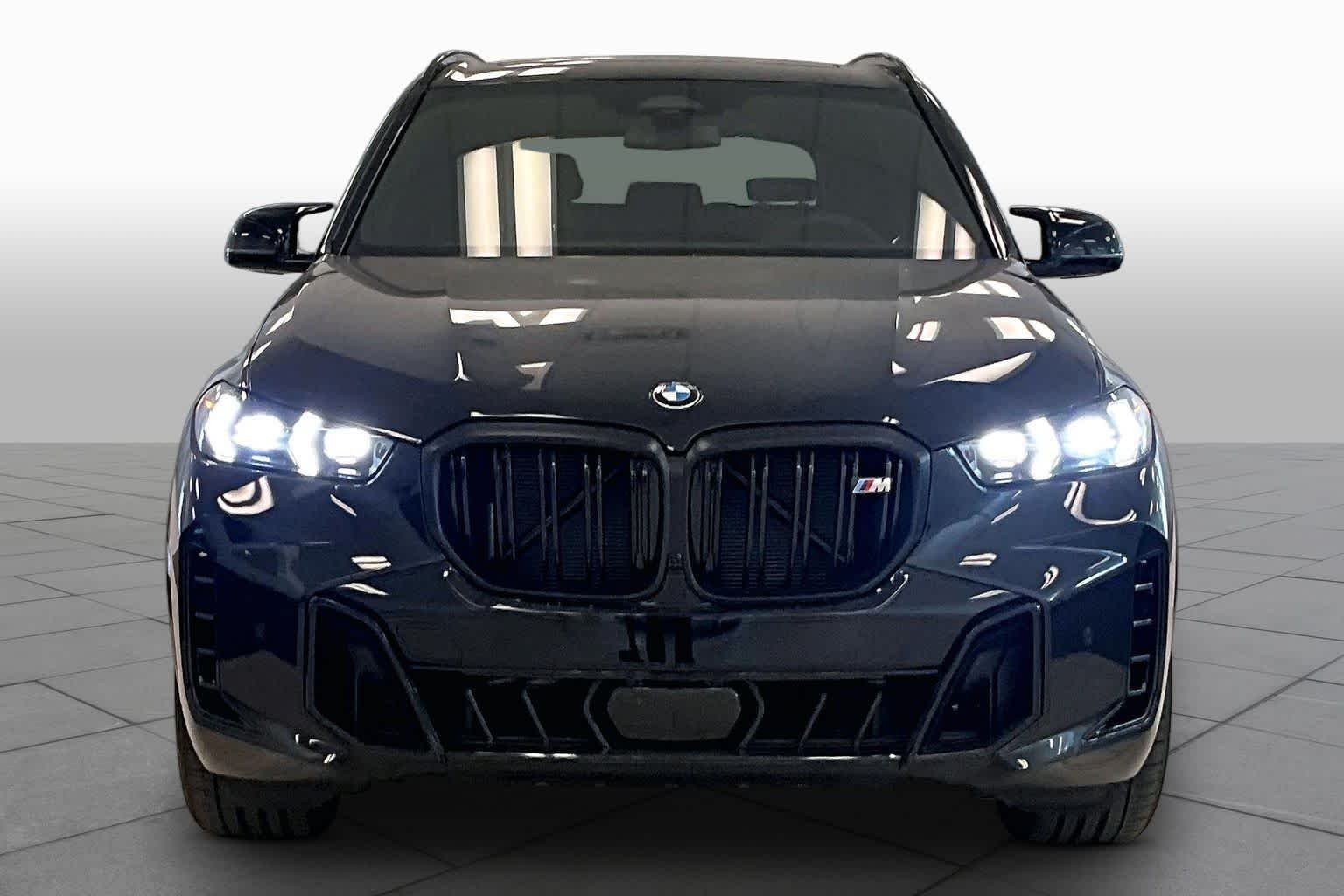 Used 2026 Black Sapphire Metallic BMW M60i image 3