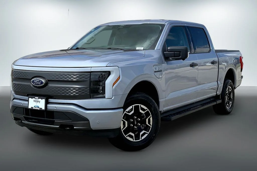 Used 2022 Ford F-150 Lightning XLT with VIN 1FTVW1EL5NWG06685 for sale in Kansas City