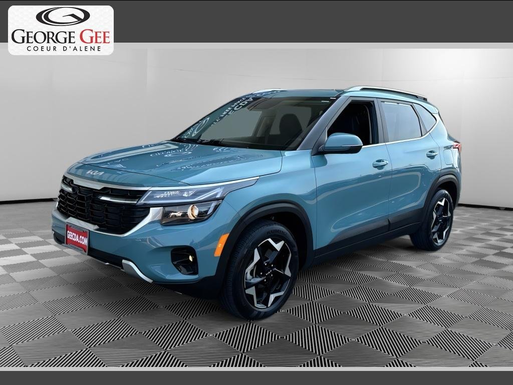 Used 2024 Pluton Blue Kia EX image 1