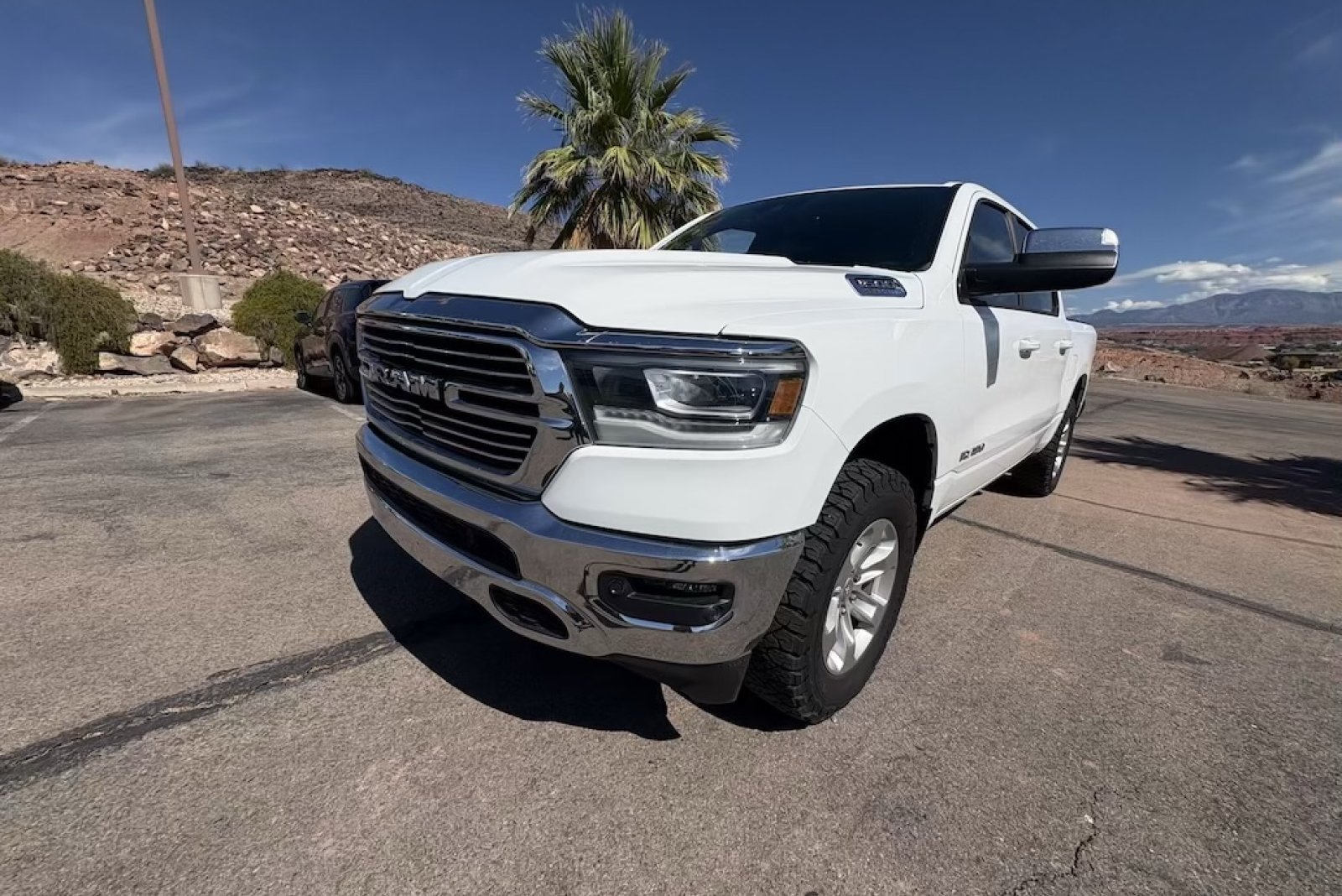Used 2023 Bright White Clearcoat Ram Laramie image 1