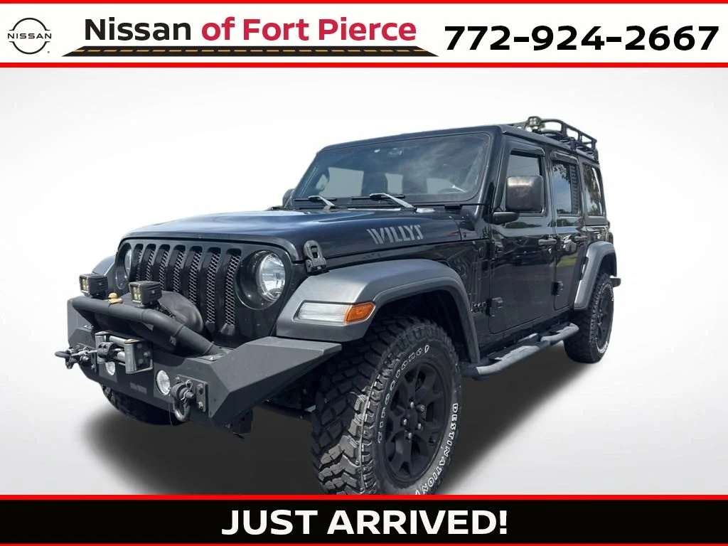 Used 2020 Black Clearcoat Jeep Unlimited Sport image 1