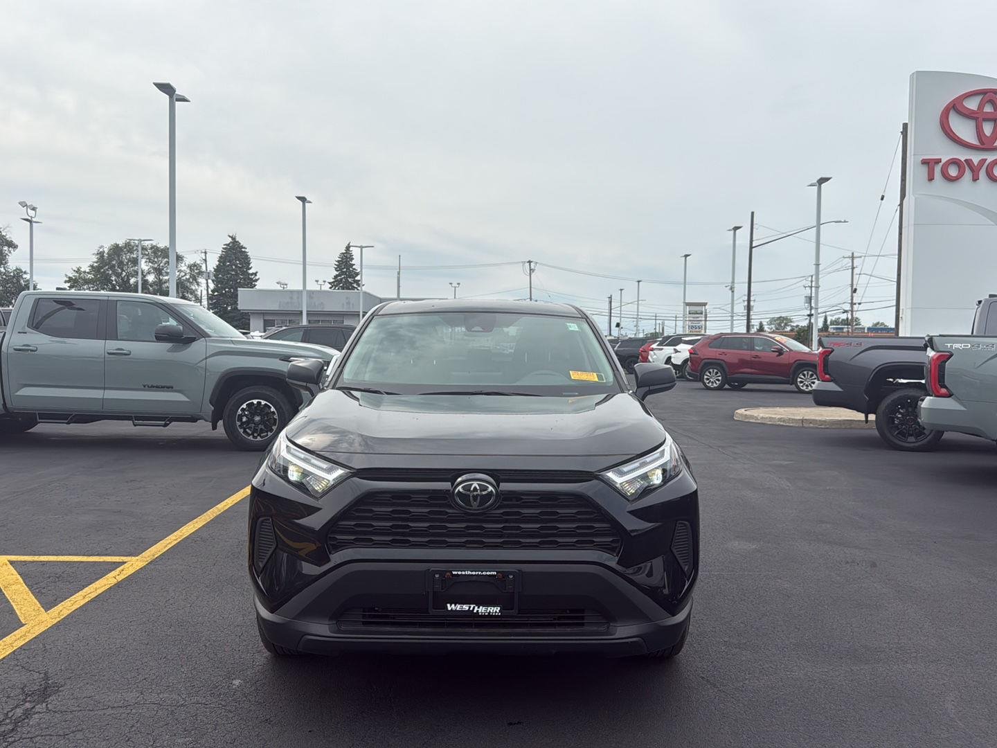 Used 2024 Midnight Black Metallic Toyota LE image 2