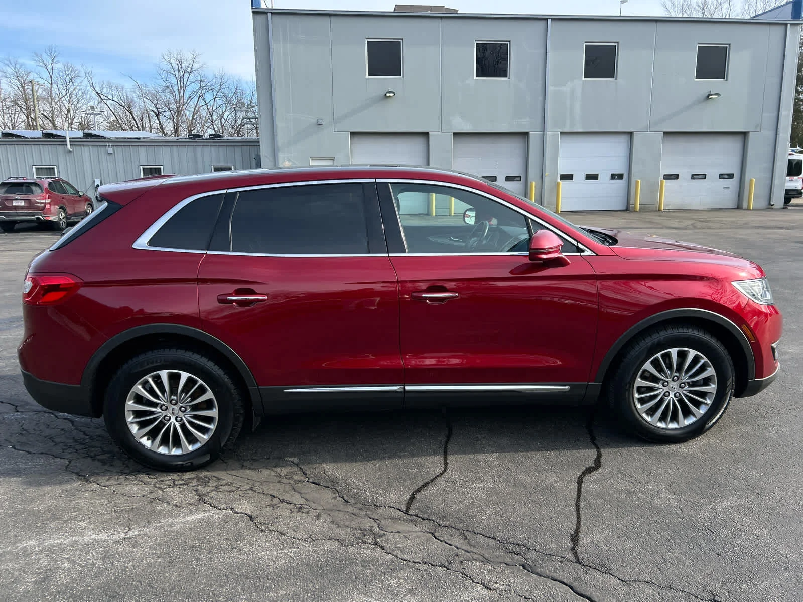 Used 2016 Ruby Red Metallic Tinted Clearcoat Lincoln Select image 2