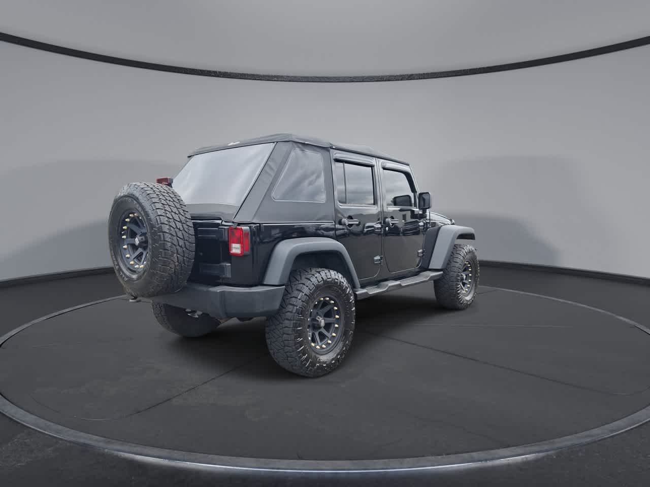 Used 2013 Black Clearcoat Jeep Sport image 8