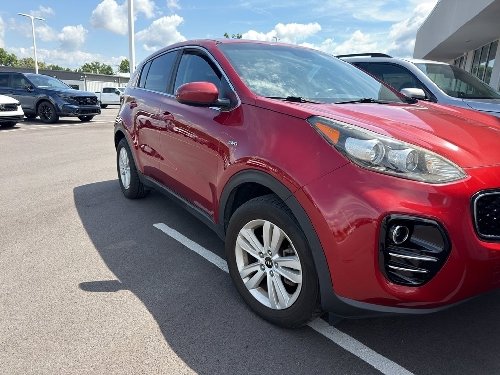Used 2019 HYPER RED Kia LX image 1