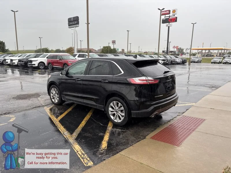 Used 2024 Black Metallic Ford Titanium image 3