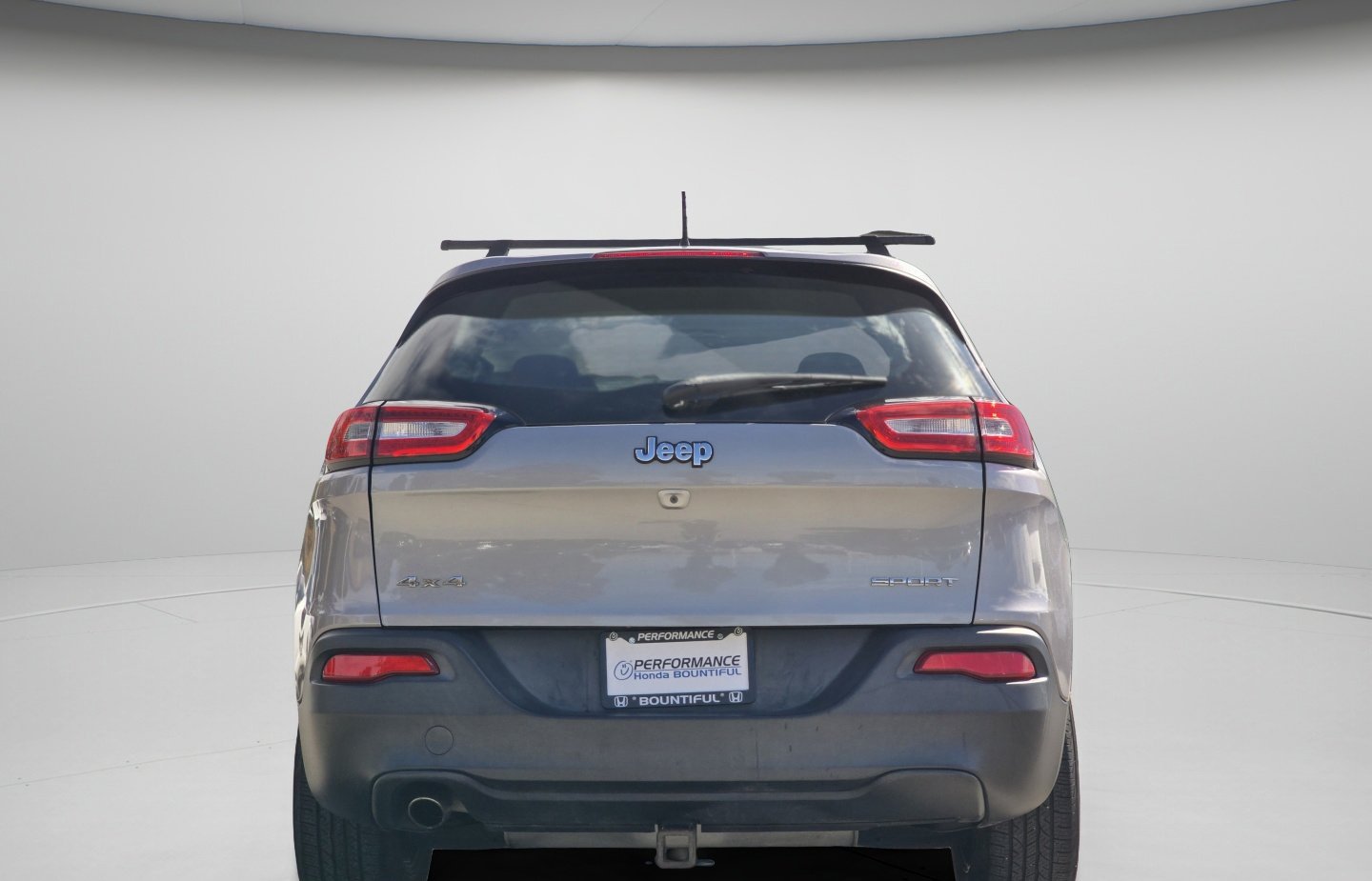 Used 2015 Billet Silver Metallic Clearcoat Jeep Sport image 22