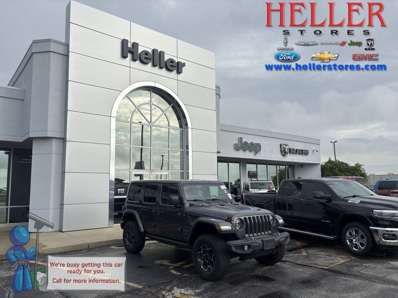 Used 2021 Granite Crystal Metallic Clearcoat Jeep Unlimit image 1