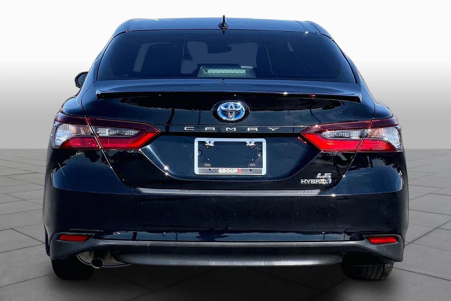 Used 2023 Midnight Black Metallic Toyota Hybrid LE image 5