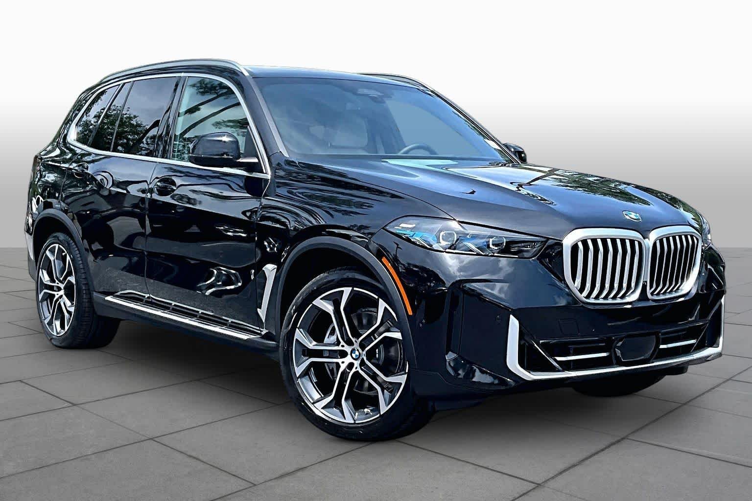 New 2026 Black Sapphire Metallic BMW xDrive40i image 2