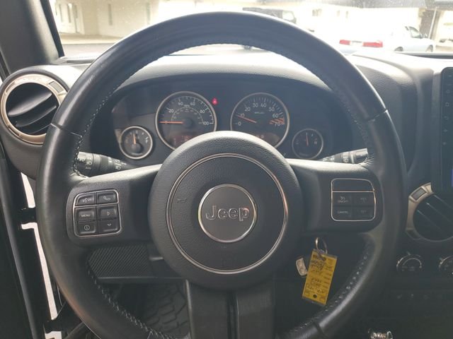 Used 2017 Black Jeep Unlimited Sahara image 10