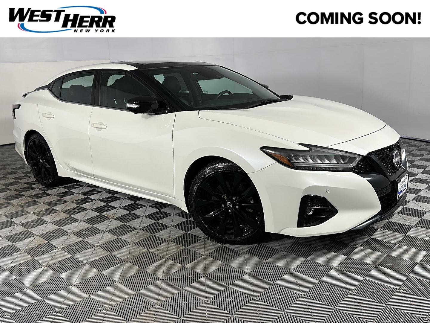 Used 2023 Pearl White Tricoat Nissan SR image 1