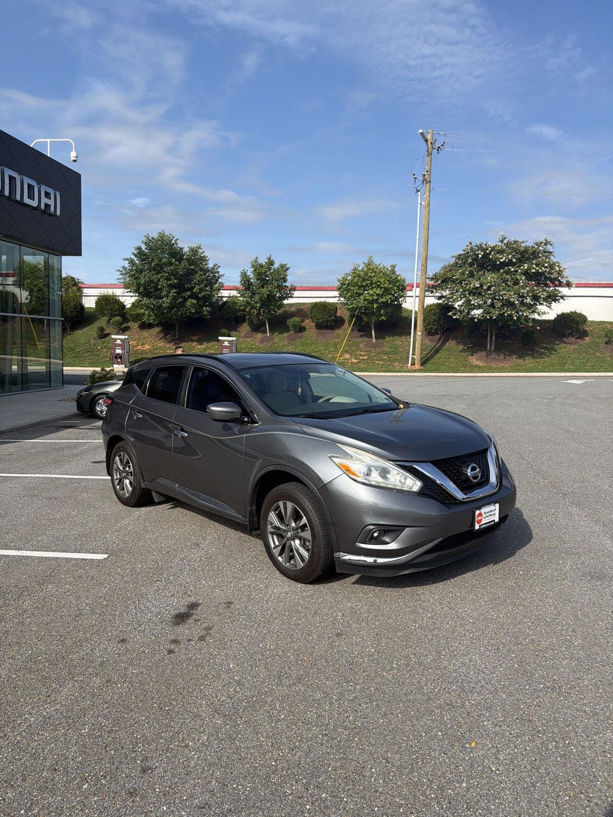 Used 2016 Gun Metallic Nissan SV image 5