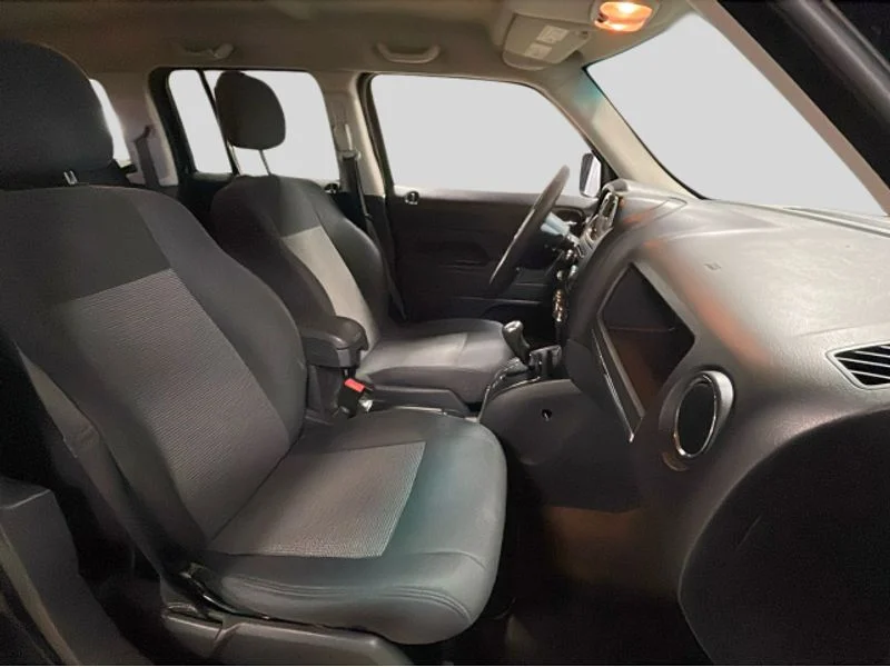 Used 2015 Black Clearcoat Jeep Sport image 14