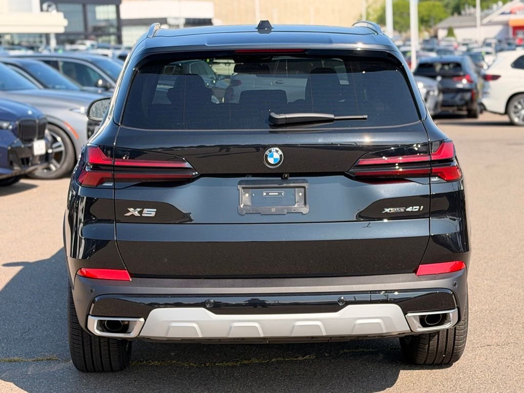 New 2026 Black Sapphire Metallic BMW xDrive40i image 4