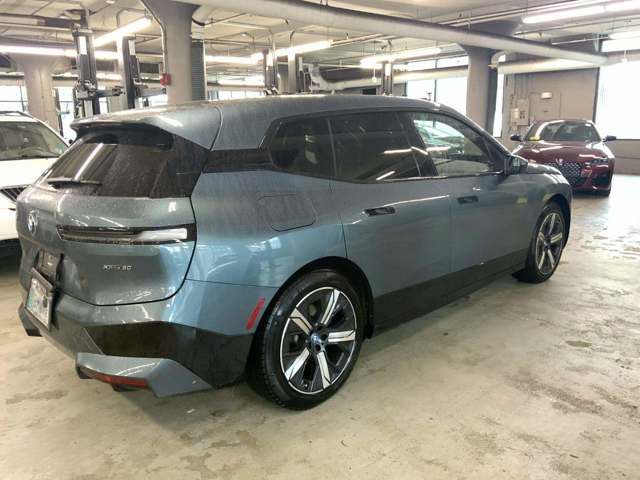 Used 2023 Blue BMW xDrive50 image 2