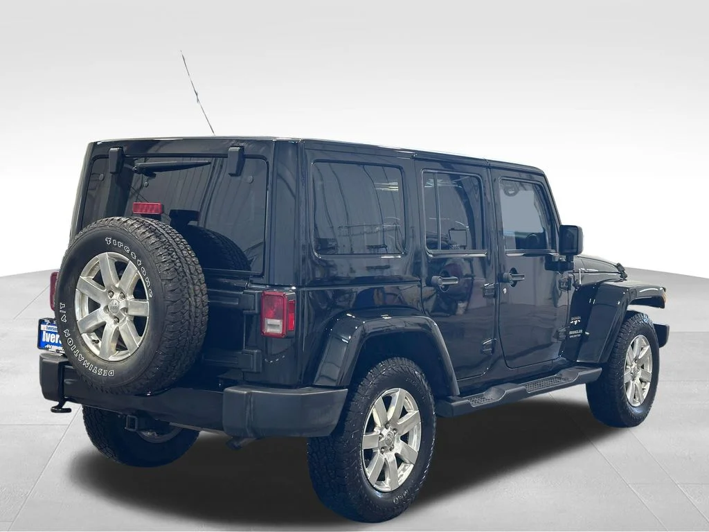 Used 2016 Black Jeep Unlimited Sahara image 7