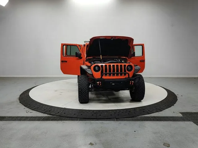 Used 2018 Orange Jeep Unlimited Sahara image 10
