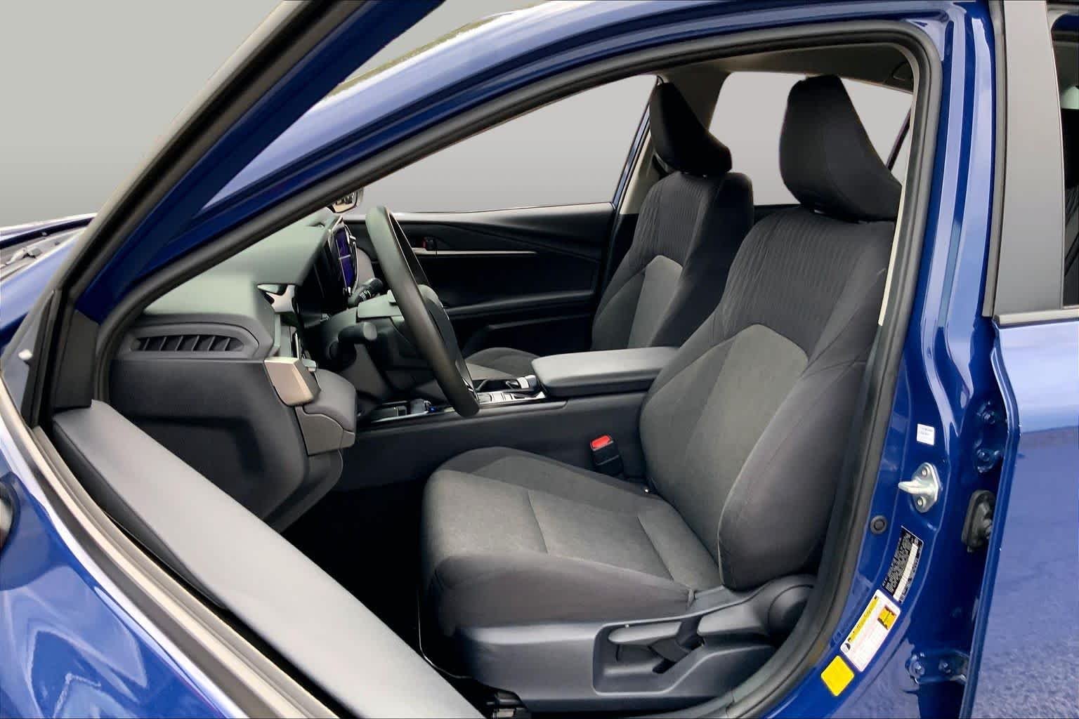 Used 2025 Reservoir Blue Toyota LE image 8