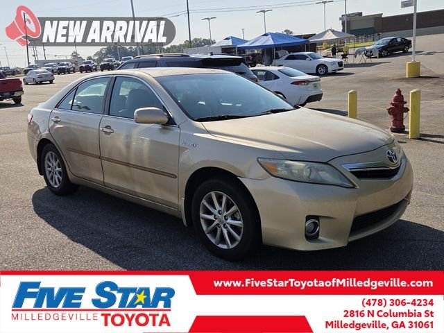 Used 2010 Gold Toyota Base image 1