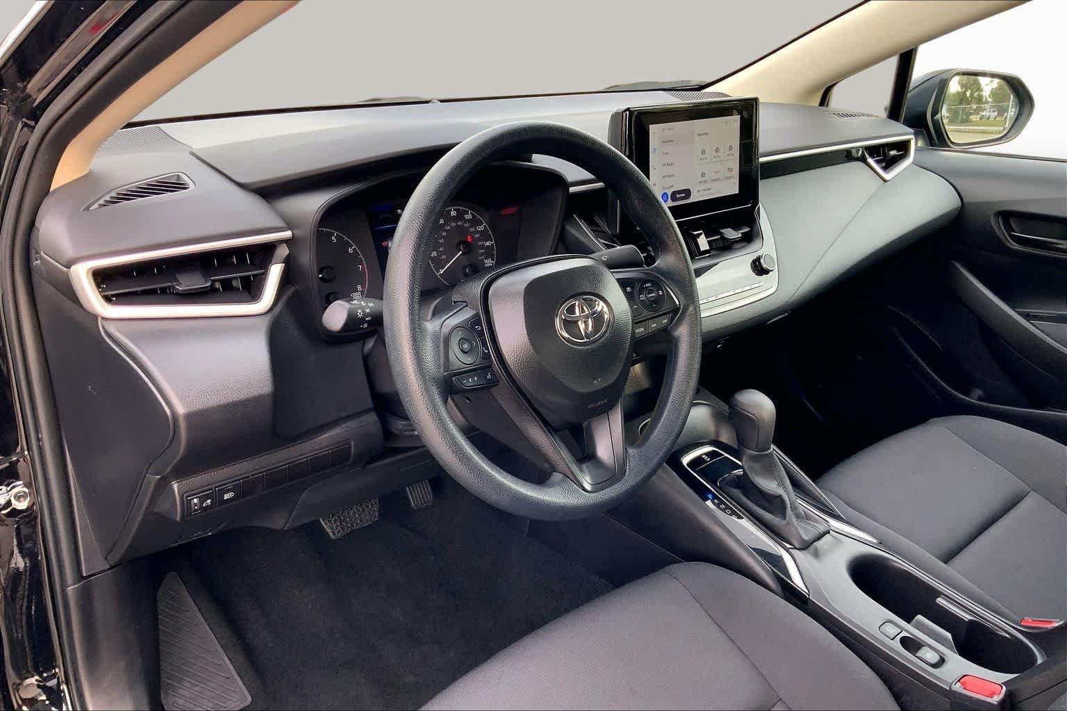 Used 2025 Midnight Black Metallic Toyota LE image 18