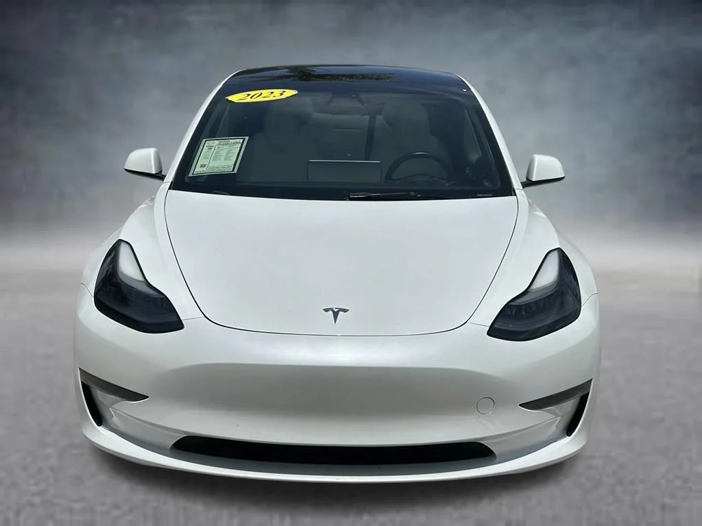 Used 2023 Tesla Model 3 Base with VIN 5YJ3E1EAXPF587017 for sale in Fort Pierce, FL