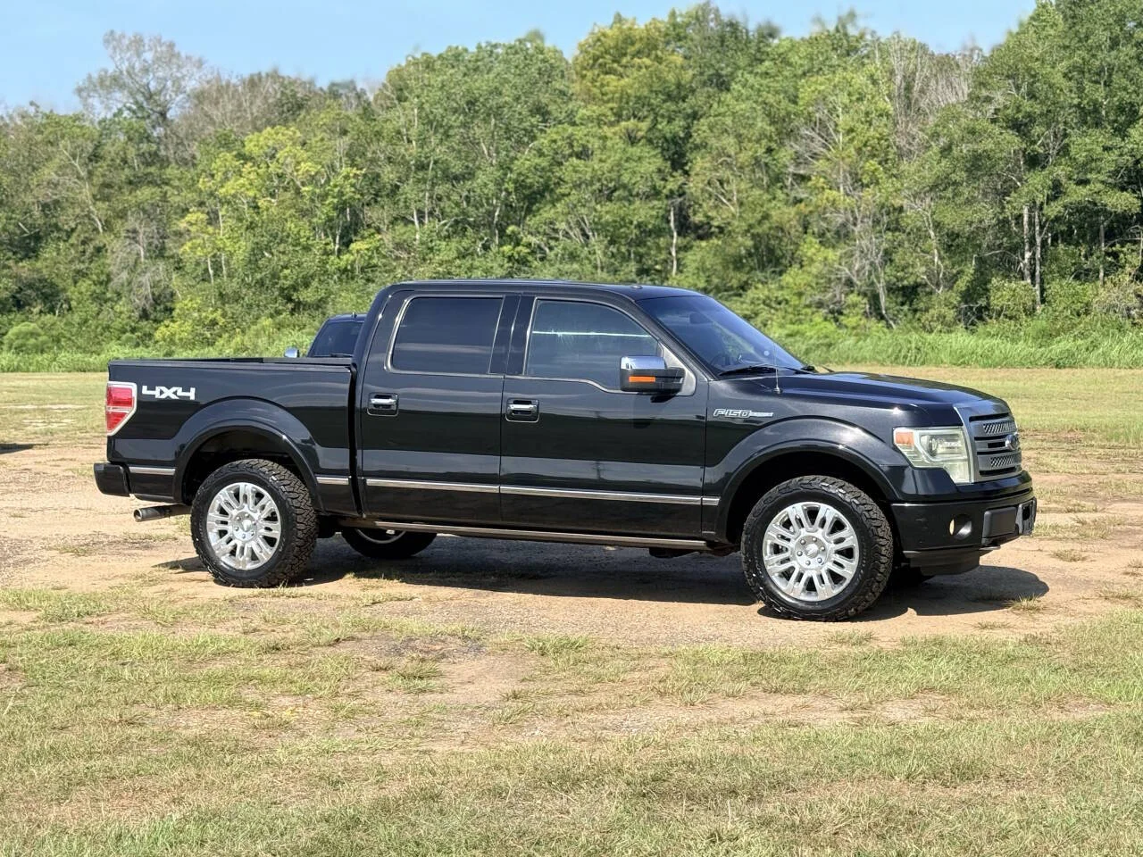 Used 2013 Black Ford Lariat 4x4 4dr SuperCrew Styleside 6.5 ft. SB image 7
