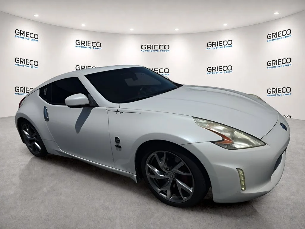 Used 2017 White Nissan Sport image 1