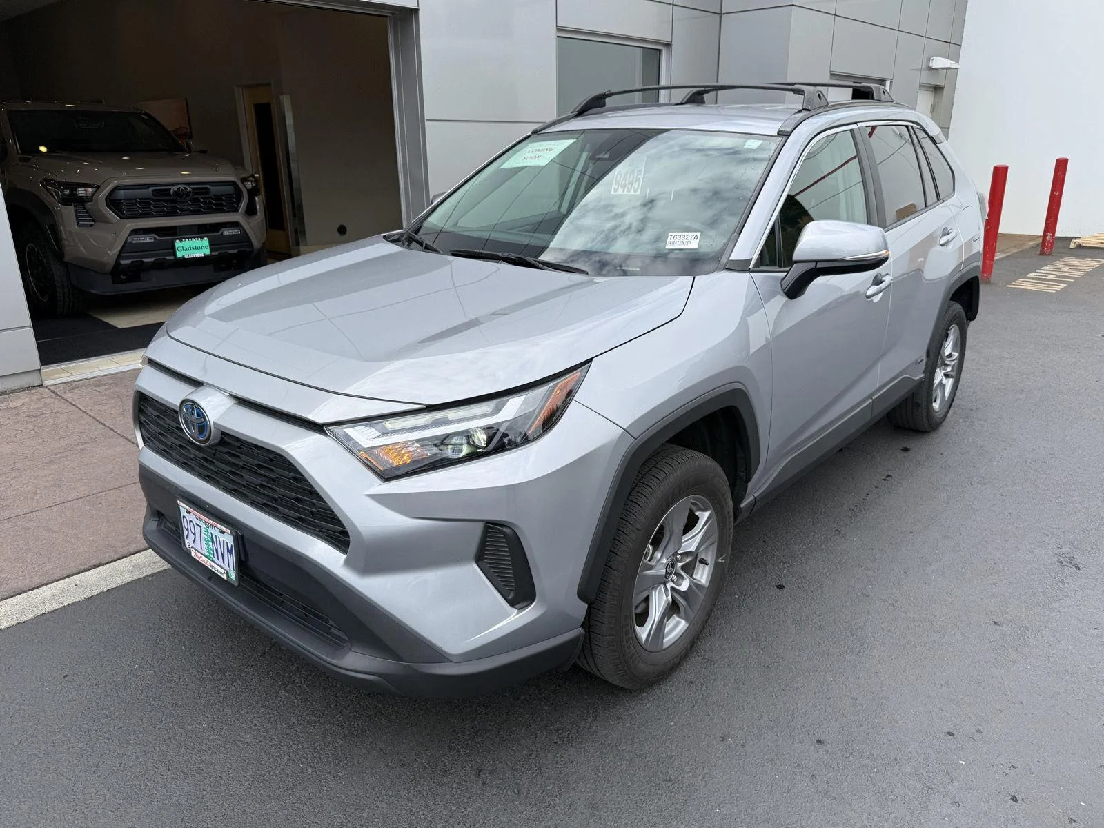 Used 2022 Silver Sky Metallic Toyota Hybrid XLE image 1