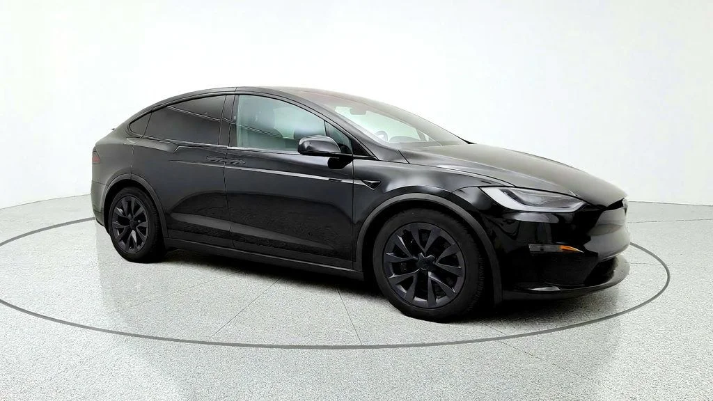 Used 2023 Solid Black Tesla AWD image 3