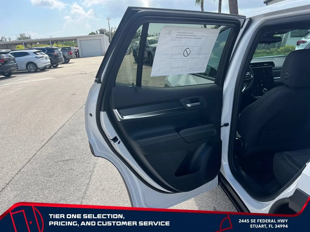 New 2027 Summit White GMC FWD Elevation image 22