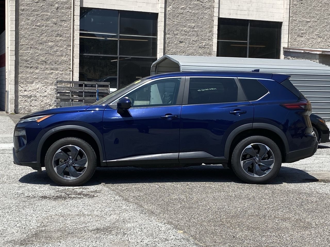 Used 2024 Deep Ocean Blue Pearl Nissan SV image 2