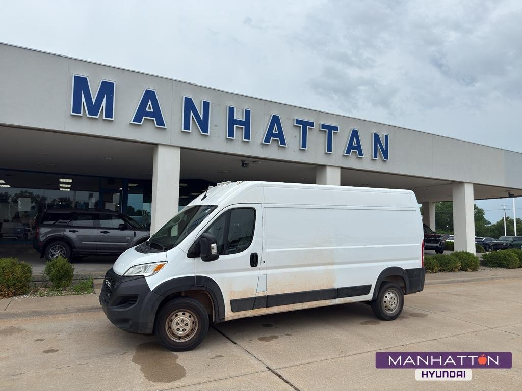 Used 2023 Bright White Clearcoat Ram High Roof 159WB image 1