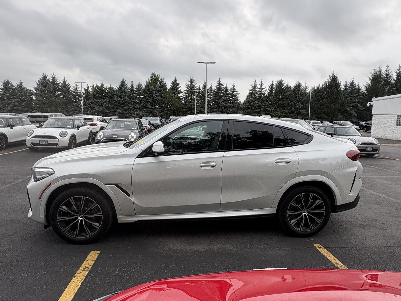 Used 2022 Mineral White Metallic BMW xDrive40i image 4