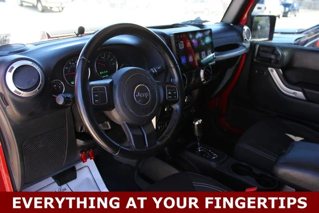 Used 2018 Red Jeep Unlimited Sahara image 2