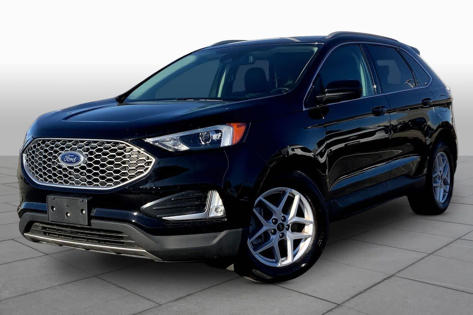 Certified Used 2023 Agate Black Metallic Ford SEL image 2