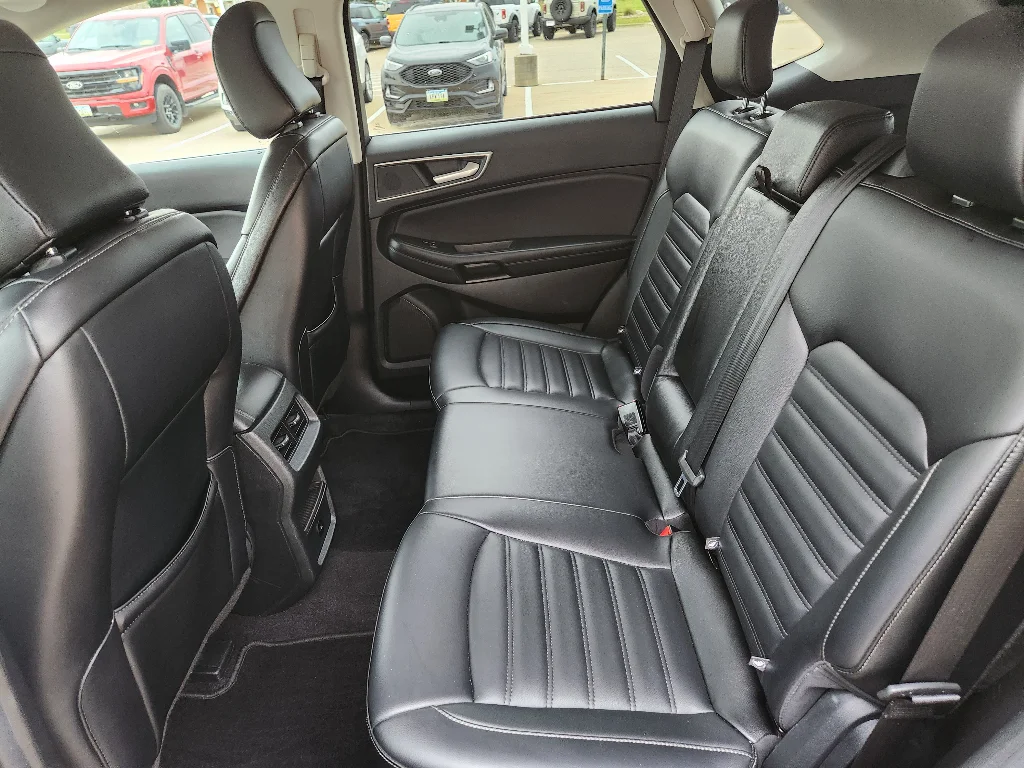 Used 2024 Agate Black Metallic Ford SEL image 18