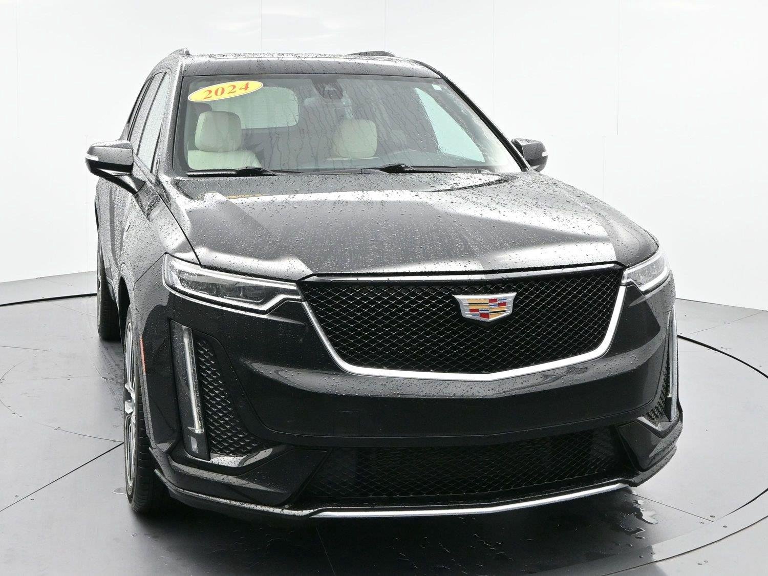 Used 2024 Stellar Black Metallic Cadillac Sport image 2