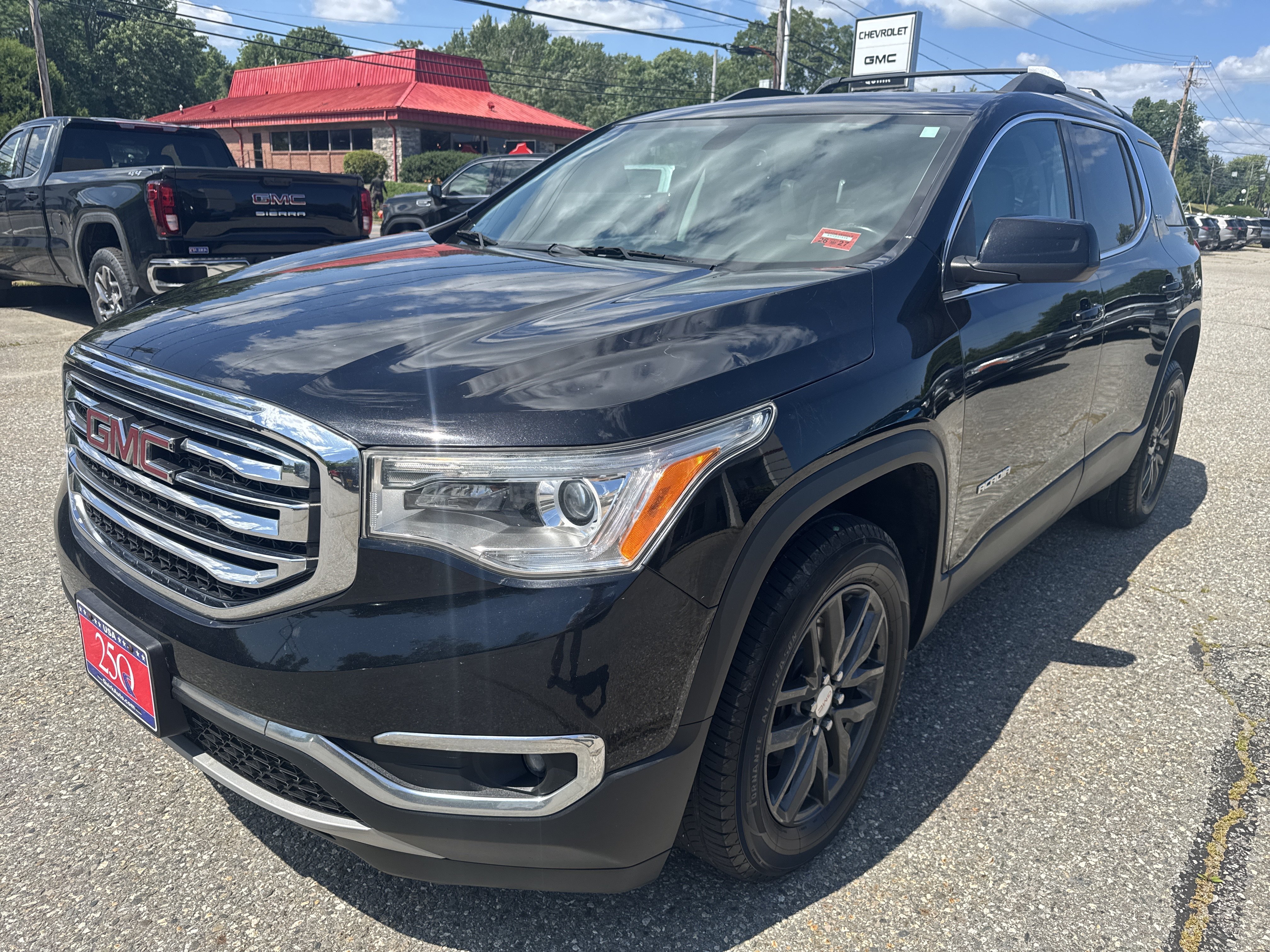Used 2017 Ebony Twilight Metallic GMC SLT image 1