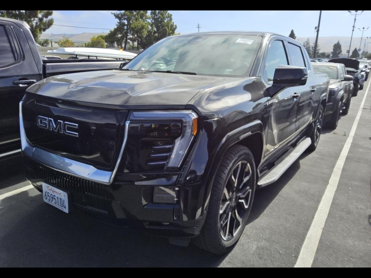 Used 2025 Onyx Black GMC Max Range Denali image 1
