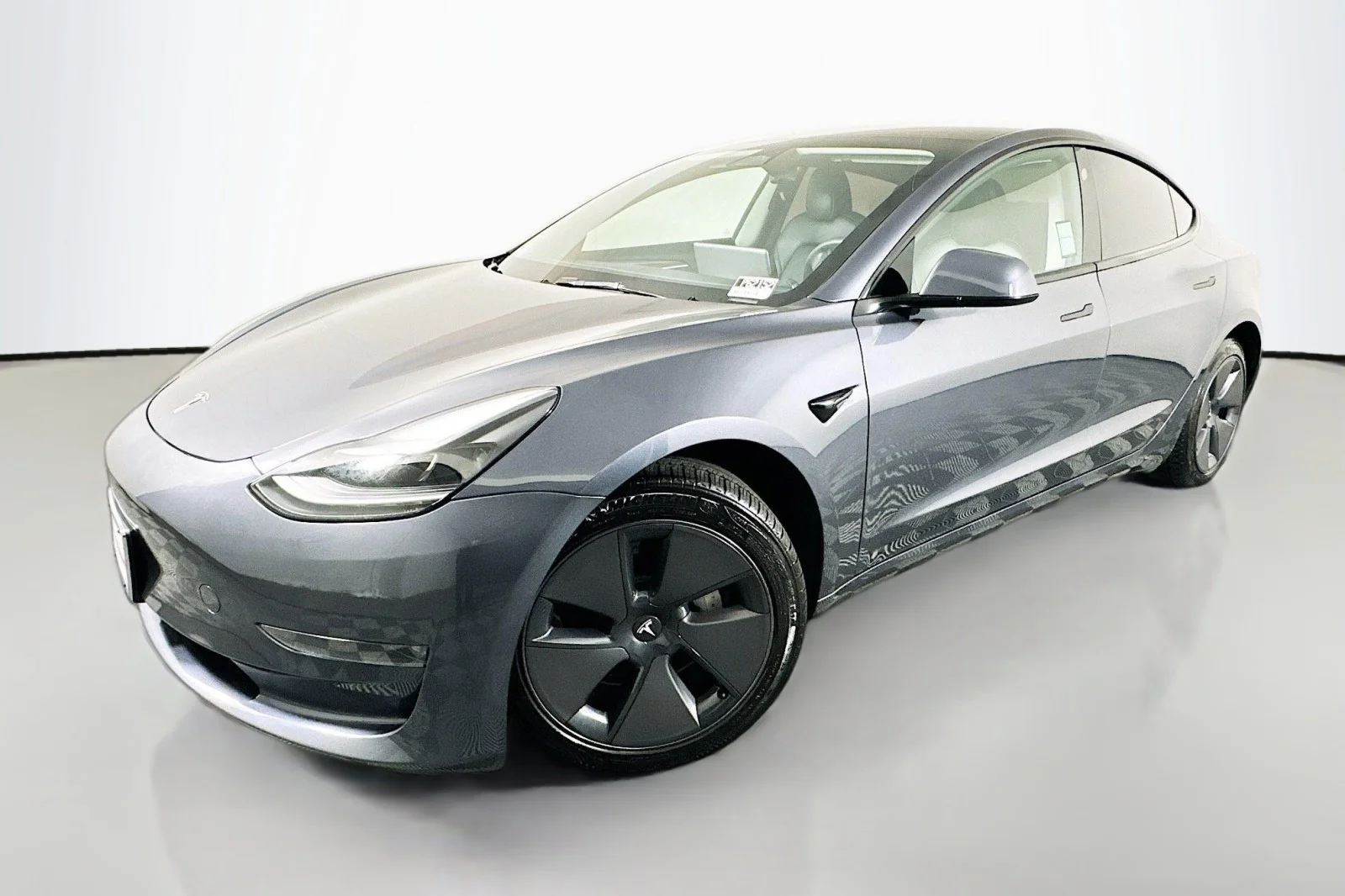 Used 2023 Midnight Silver Metallic Tesla  image 1
