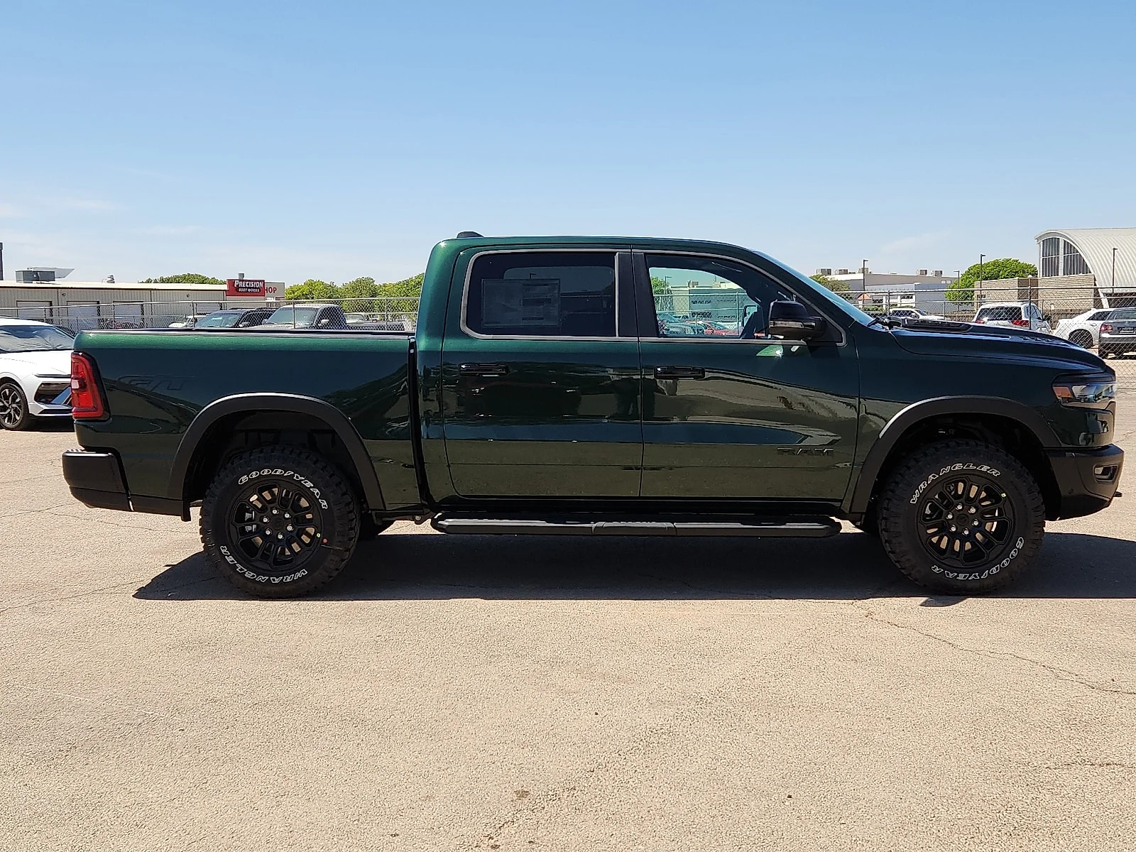 New 2026 Serrano-Green Metallic  Paint Ram REBEL CREW CAB 4X4 5
