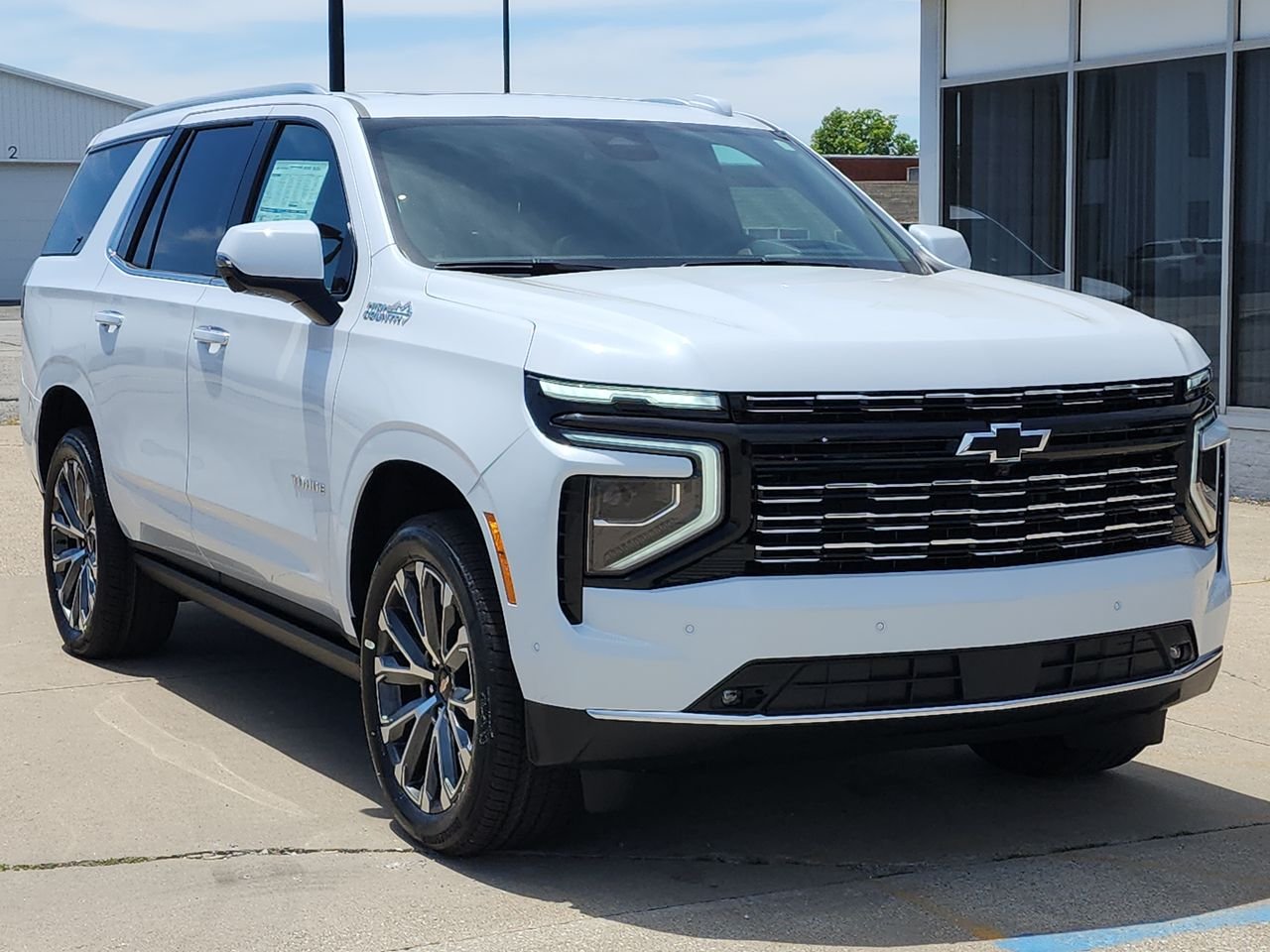 New 2026 Polar White Tricoat Chevrolet High Country image 1