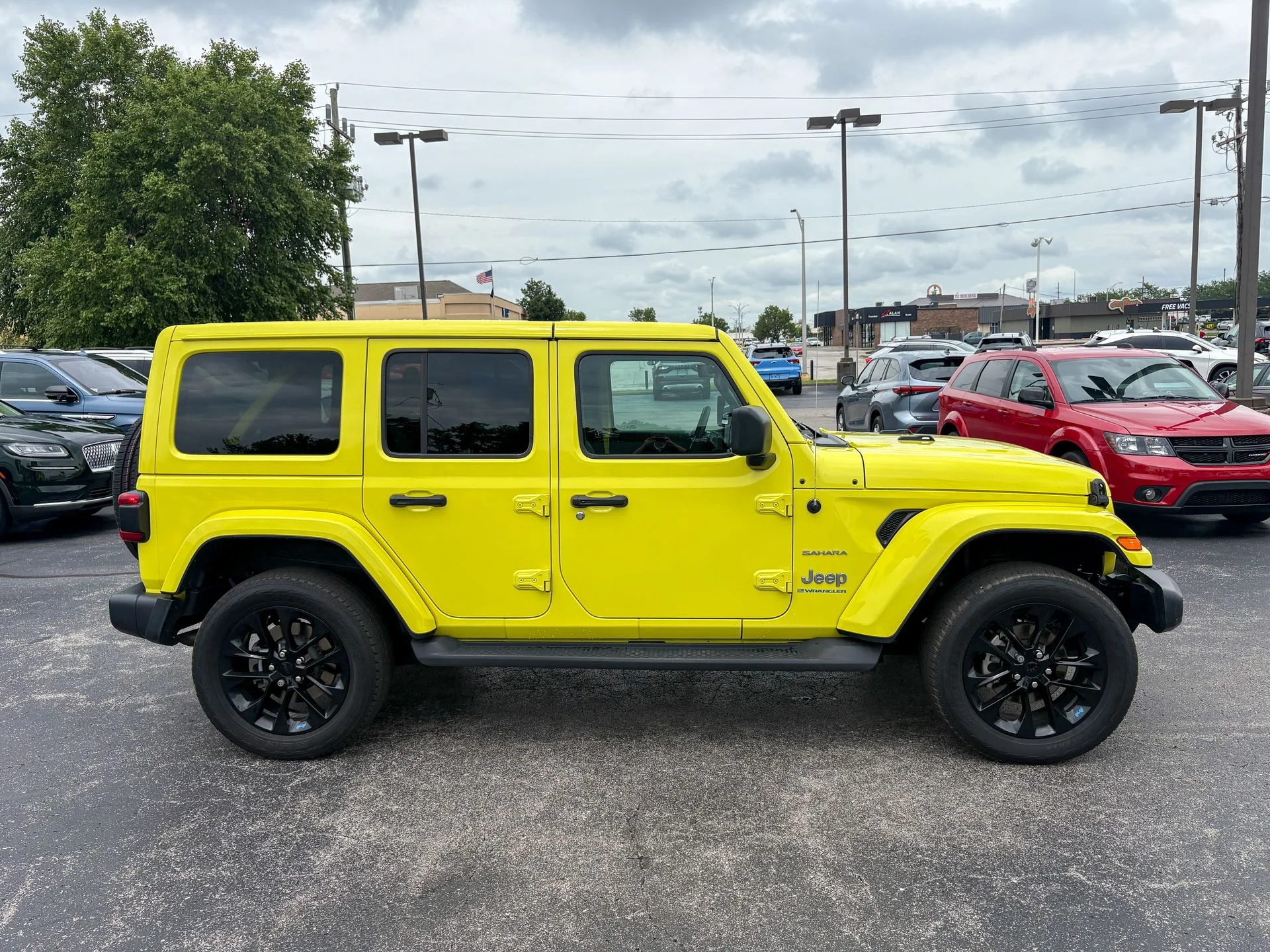 Used 2023 Yellow Jeep Sahara 4xe image 20