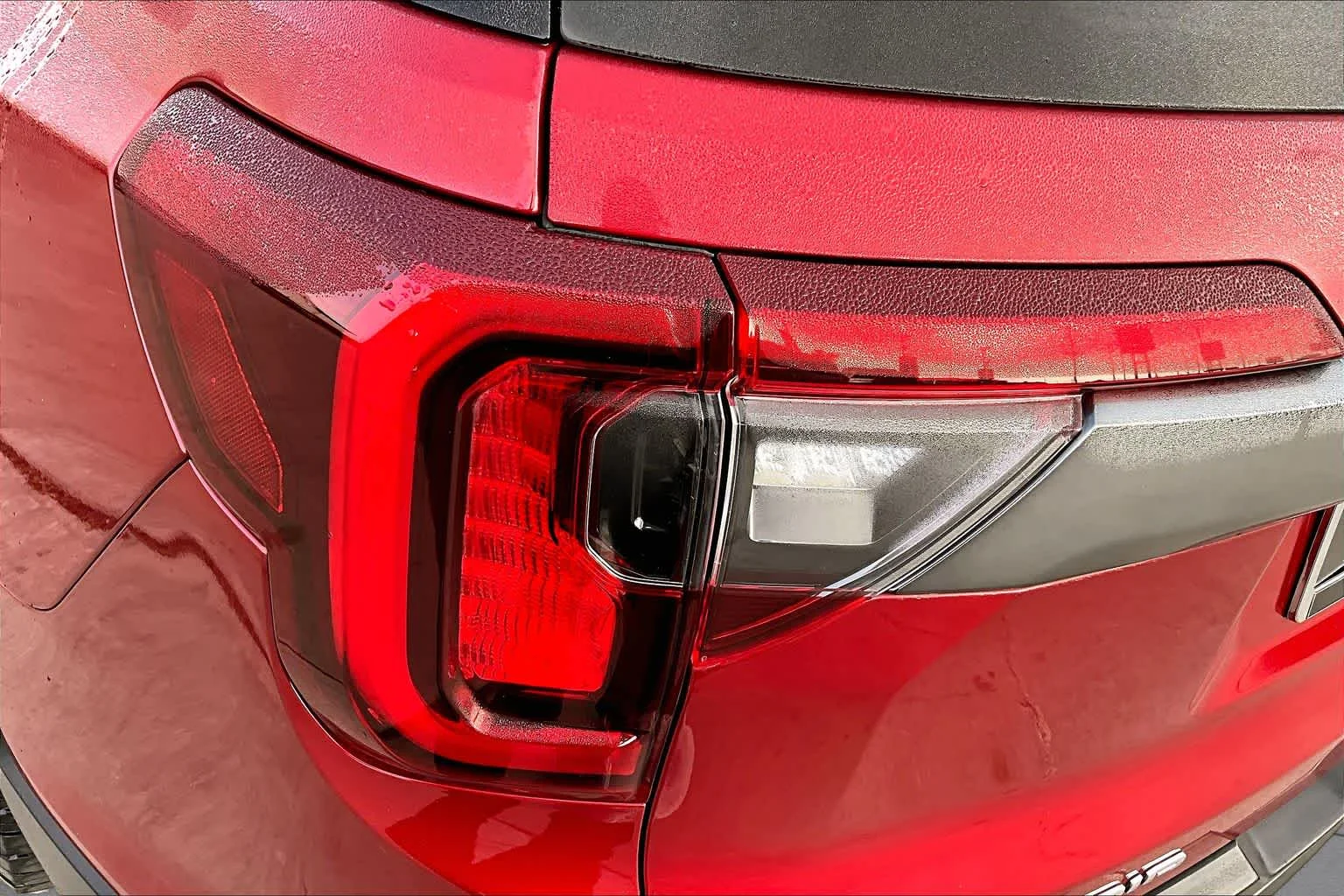 Used 2023 VOLCANIC RED TINCOAT GMC AT4 image 56